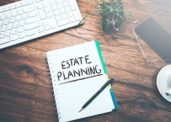 Estate planning written on notepad