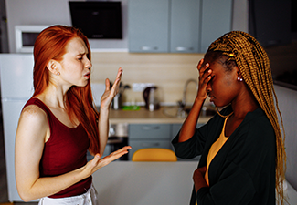 Mixed-Race Same Sex Couple Arguing in the Kitchen