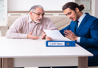 Young male lawyer visiting old man in testament concept