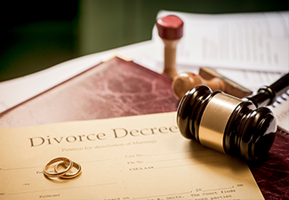 Divorce decree and wooden gavel