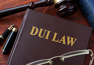 DUI Law Title on a book and gavel