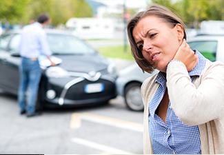 Woman Feeling Pain After Car Accident