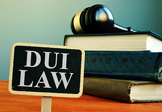 DUI Law Driving Under the Influence Sign and Books