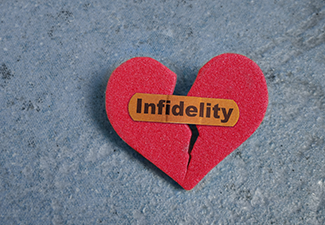 Broken heart labeled "infidelity"