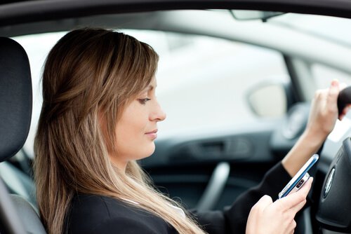 Women Texting and Driving