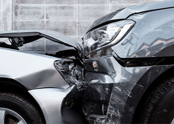 Two wrecked cars after a collision