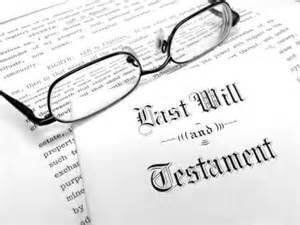 glass on a piece of paper with last will and testament on it