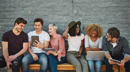 Millennials sitting on a bench