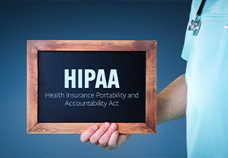 Doctor Shows Sign/board with HIPAA Text on Wooden Frame.
