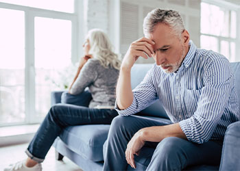 Unhappy Senior Couple at Home