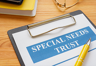 Special needs trust application with clipboard and notepad.