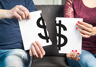 Man and Woman Holding Ripped Paper with Dollar Sign