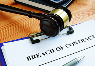 Breach of Contract Papers with Pen and Gavel