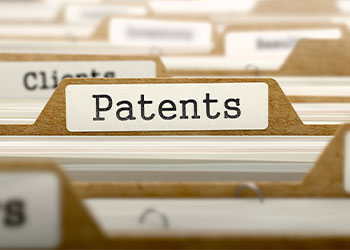 Patents Concept with Word on Folder