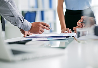 Hands of Business People Working with Documents