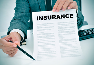 Young Man in Suit Showing an Insurance Policy