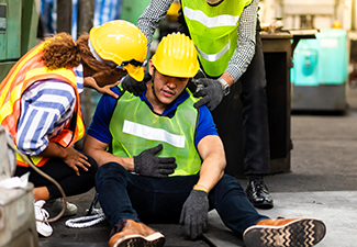 Engineering supervisor and  his coworker lying unconscious at industrial factory. 