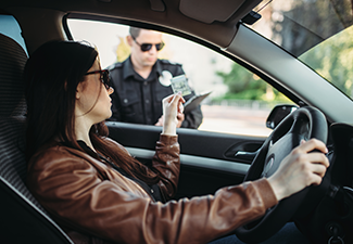 Male Cop in Uniform Writes a Fine to Female Driver