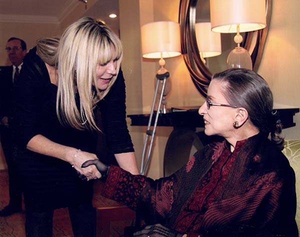 Attorney Judith Wayne greeting an important figure