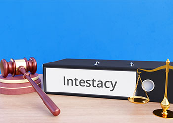 Intestacy – Folder with labeling, gavel and libra