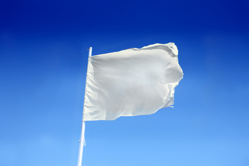 A white surrender flag.