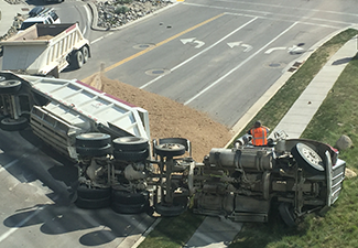 Truck accident flipped over.