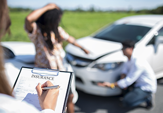  Insurance Agent Examining Car After Accident