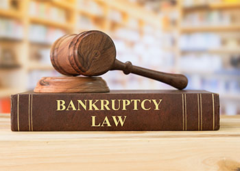 Bankruptcy law book and gavel