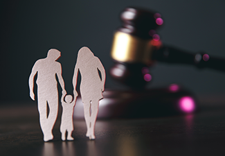 Family Figure and Gavel on Table