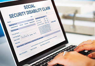 Social Security Disability form on laptop screen