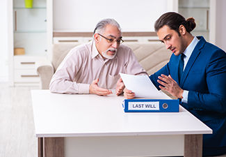 Young Male Lawyer Visiting Old Man in Testament Concept