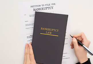 Cropped View of Woman with Bankruptcy Paper