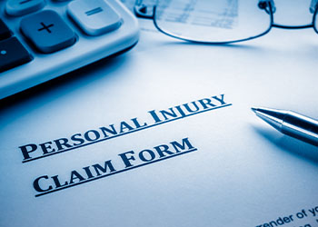 Personal injury claim form on desk