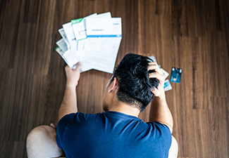  stressed Young Asian Man Hands Holding the Head 