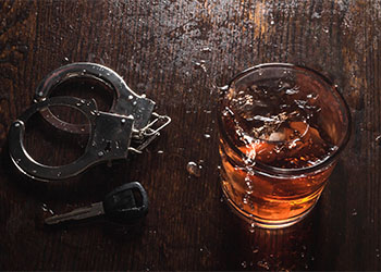 Alcohol Glass, Handcuff and Car Keys