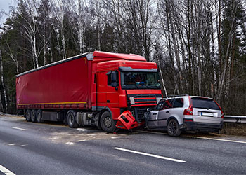 Car after a collision with a heavy truck