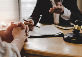 Justice Lawyer Discussing Contract Document with Businessman