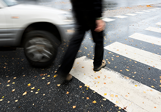 Person About to Get Hit by Car on A Crosswalk