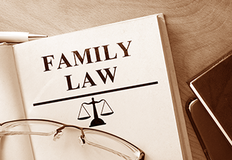 Book with Words Family Law and Glasses