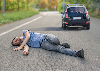 Injured man in front of car, Hit and run concept