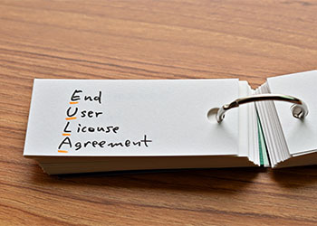 The words "End User License Agreement" written in a word book