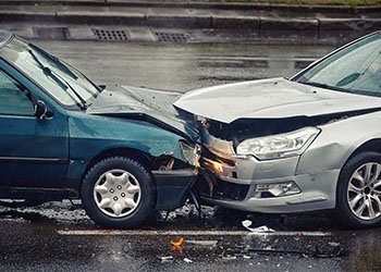 Car accident on wet road during rain