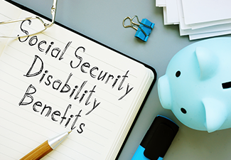 Social Security Disability Benefits Written on Note with Pen