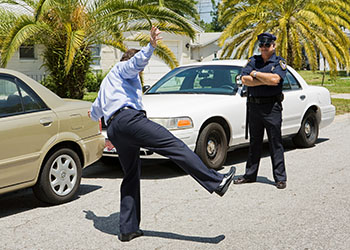 Policeman taking sobriety test