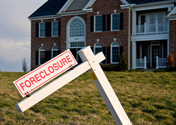 Foreclosure Sign by house