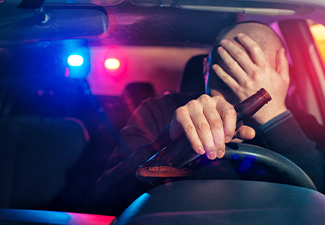 Sad man is caught driving under alcohol influence