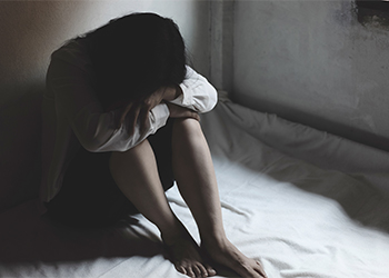 Sad women in dark room