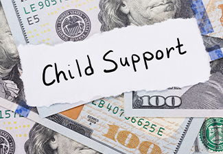 Child Support Note Placed On Top Of Dollar
