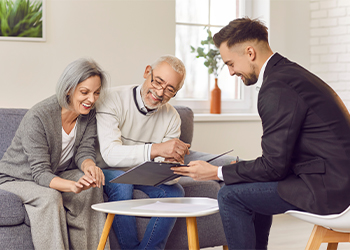 Senior Couple discussing estate plan with attorney