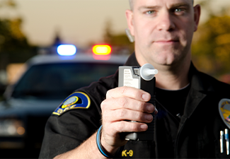 Police Officer with Breath Tester